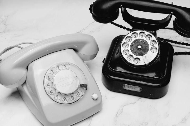 Two vintage rotary phones used as audio guestbooks