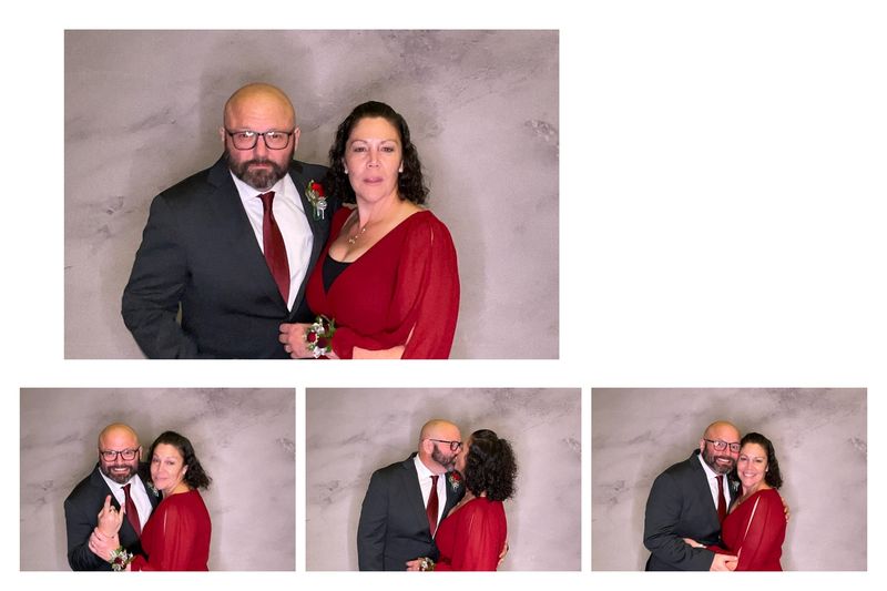 Family at a wedding reception photo booth