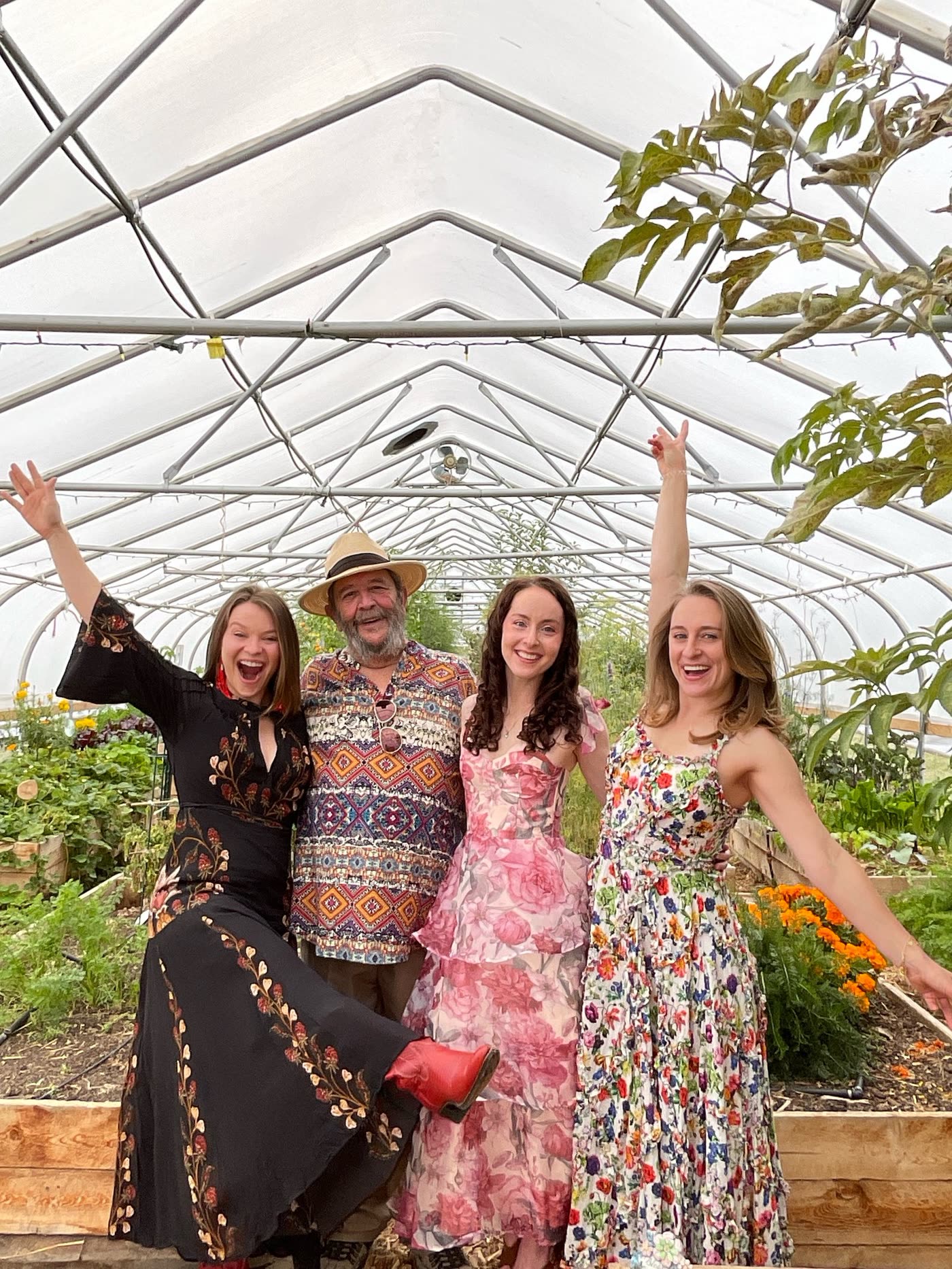 Bride and bridal party in a greenhouse venue